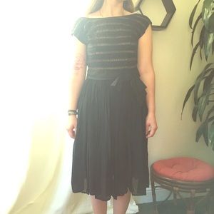 Vintage 1950s black silk and lace dress.